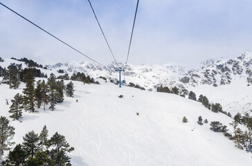 Fototapeta na wymiar Winter snow landscape mountain view of ski resort in Andorra, Europe