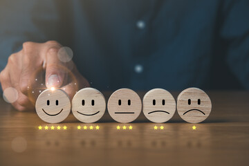 Business man select satisfaction icons for customer satisfaction scores. customer survey rating...