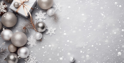 Christmas  New Year's silver toys and gifts on a grey background. Flat layout greeting card template with copy space. Holiday banner