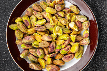 pistachio peeled nut healthy eating cooking appetizer meal food snack on the table copy space food background rustic top view