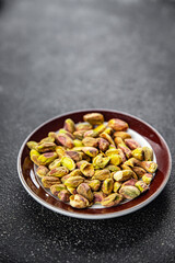 pistachio peeled nut healthy eating cooking appetizer meal food snack on the table copy space food background rustic top view