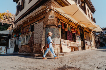Old street in the old town of Antalya - Turkey; tourist sightseeing.