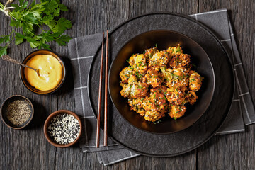 bang bang broccoli bites in bowl, top view