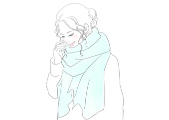 マフラーをした笑顔の女性