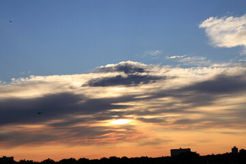 Colorful cloudy sky at sunrise as natural background