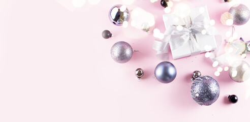 Gray Christmas decorations with gift box on pink banner
