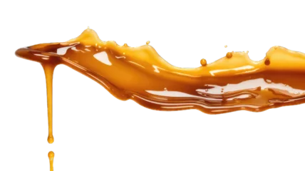 Foto op Plexiglas Melted caramel, delicious caramel sauce or maple syrup swirl isolated on white background. © morepiixel