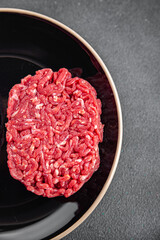 cutlet raw meat fresh appetizer beef hamburger cooking eating meal food snack on the table copy...
