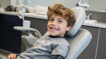 Little boy sits on a chair in a dental clinic