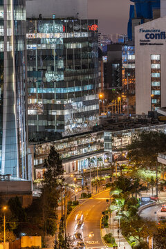 View of skyline in San Isidro district at night. 