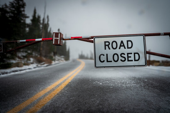 road closed sign in snow