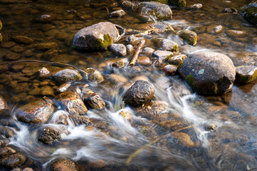 water flowing into the rocks