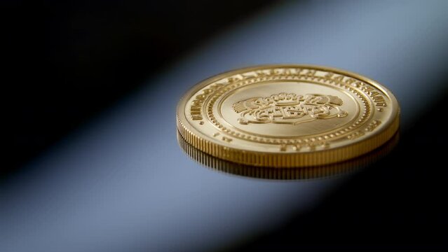 One Hundred Barchant, 1oz gold coin. Cash money of the kingdom of the North Barchant. Money and rewards of the virtual state. Textured coat of arms engraved in gold.