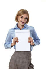 laughing blonde business woman in blue shirt holding empty clipboard on white background