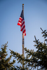 american flag in the wind sunrise