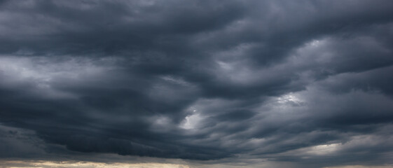 Carbon dioxide emissions, greenhouse effect, global warming, climate change. The dark sky with...