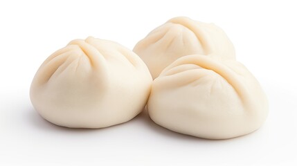 Fototapeta na wymiar Three steamed dumplings on a white surface, bao buns.