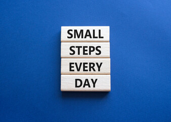 Small Steps Every Day symbol. Wooden blocks with words Small Steps Every Day. Beautiful deep blue background. Business and Small Steps Every Day concept. Copy space.
