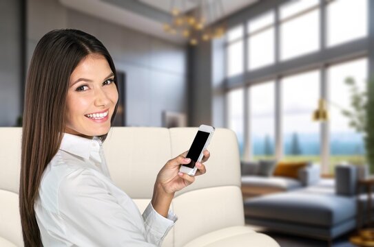 Young happy woman using phone at home, AI generated image