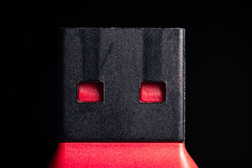 USB flash drive close-up on a black background