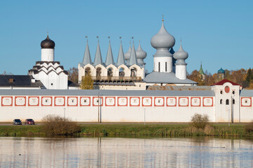 Fototapeta na wymiar Sunny October day at the ancient Tikhvin Assumption Monastery. Leningrad region, Russia