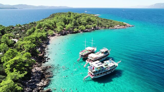Marmaris, Mugla, Turkey. Incekum Beach in Marmaris with perfect turquoise water. Aerial view of beach, drone shot.