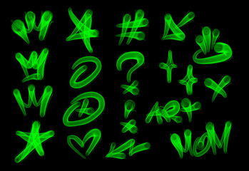 Collection of graffiti street art tags with words and symbols in light green color on black background