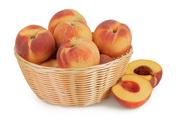 Ripe peach fruit with half in a wicker basket isolated on white background with full depth of field