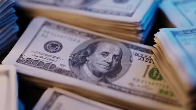 Close up, Investing in banknote dollar bills, moving camera rotates around objects