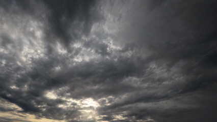 pretty skyscape of sky with massive rain or snow clouds background - photo of nature