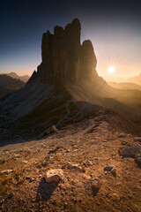Landscape of the setting sun in the Italian Dolomites. View of Tre Cime di Lavaredo. Vertical view