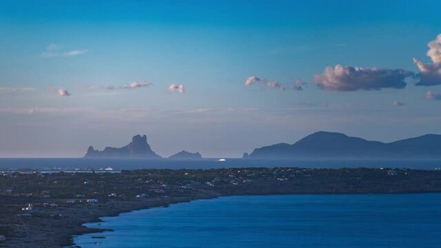 Aerial View of Formentera Island Bay with Ibiza's Iconic Es Vedra Rock Timelapse
