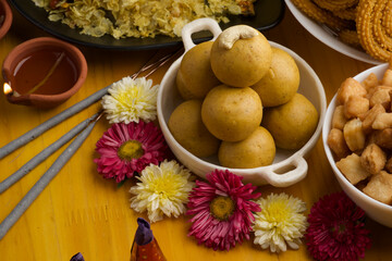 Besan ladoo or laddu are delicious sweet balls made with gram flour, sugar, ghee cardamoms, indian mithai made on diwali festival