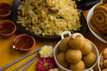 Poha Chivda or Chiwada. Diwali special savory snack, made out of Flattened rice, fried peanuts, curry leaves and some spices. Traditional Indian Diwali Snacks.