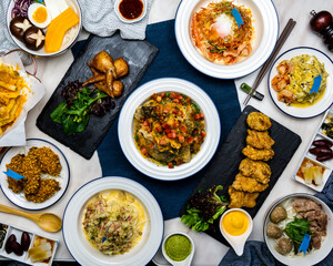 Assorted japanese food Fish Nachos, Mentaiko Chicken Wings, cheese baked fries, Fish Crispy Roll, udon thick soup, beef noodles soup, Black Truffle Shrimp Scrambled Egg, Grilled Carbonara Chicken