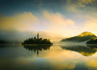 Lake Bled at sunrise under fog, Slovenia