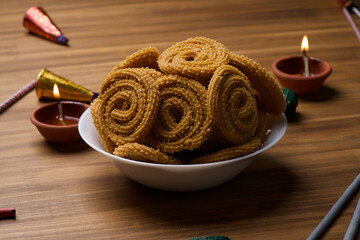 Indian Traditional Tea Time Snack Chakli, a deep fried snack, It is known as Chakali, Murukku, Muruku, Murkoo, Chakri.