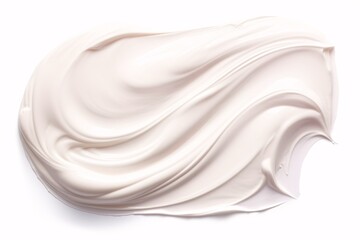Soft smudge of white skincare cream texture on a pure white background.