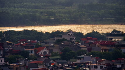 Fototapeta na wymiar Sunset over the Red river, Hanoi, Vietnam