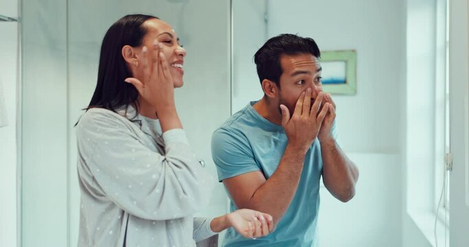 Couple, bathroom and cleaning face with cream, skincare and comic joke with laughing, serum or product. Man, woman and funny with facial oil moisturizer for beauty, wellness or self care in apartment
