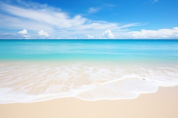 Fototapeta na wymiar a beach with blue water and clouds