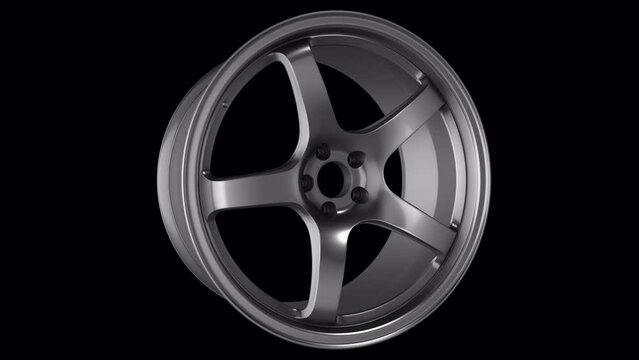 The car rim rotates on the alpha channel background in a seamless loop.