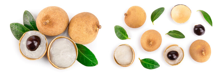 Fresh longan fruit with leaves isolated on white background. Top view. Flat lay