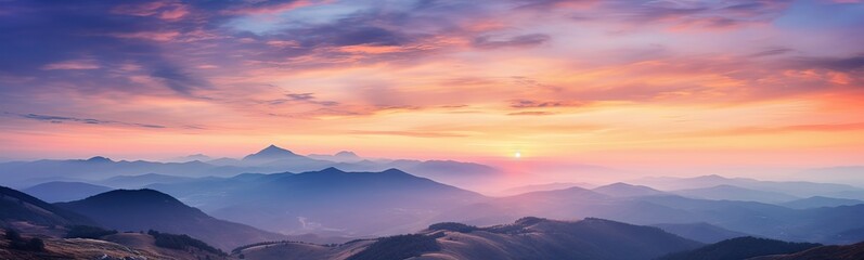 Panoramic View of Mountains at Sunset - obrazy, fototapety, plakaty