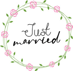 Just married lettering with floral wreath. Just married handwritten text inside floral wreath. Just married floral decoration.