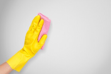 Hand holding duster cloth for cleaning