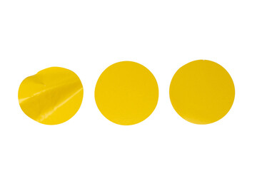 Round yellow stickers, blank tags labels isolated on a white background.