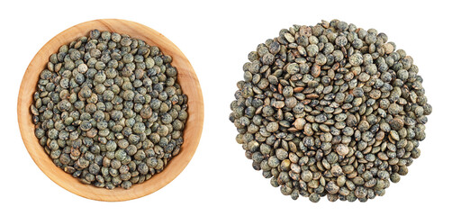 raw french green lentils in wooden bowl isolated on white background. Top view. Flat lay