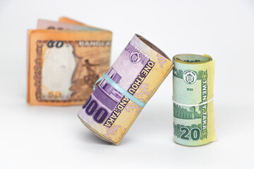 Bangladeshi taka or money bundles  banknotes  isolated white background ,