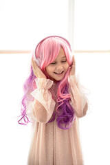 Vanilla Girl. Kawaii vibes. Little girl with pink hair have party in barbie style. Listening music with headphones
